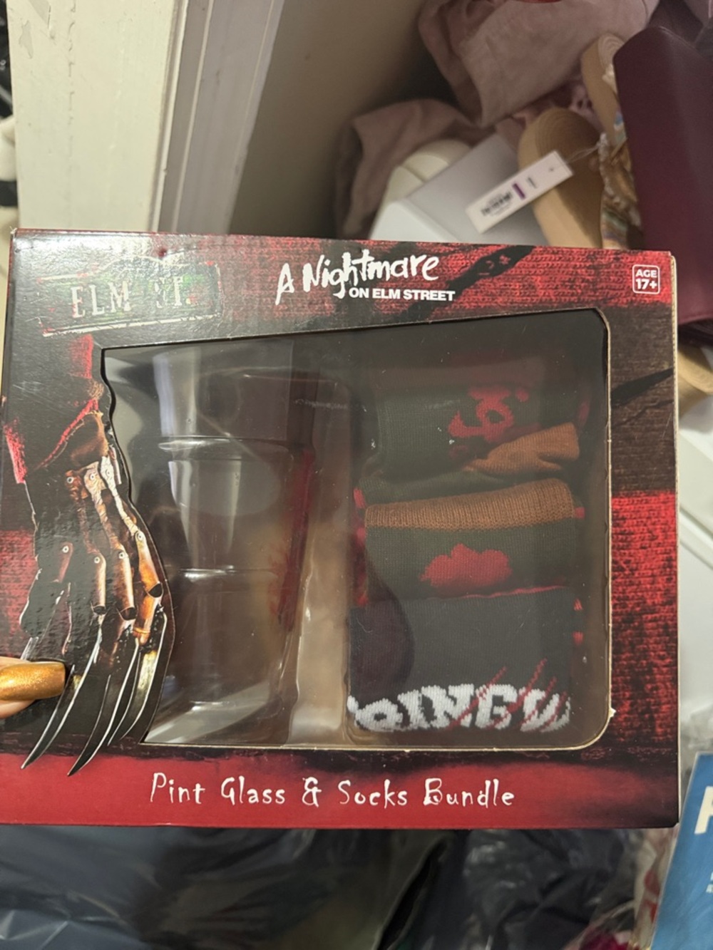 A Nightmare on Elm Street Pint Glass & Black/Red Socks Gift Set